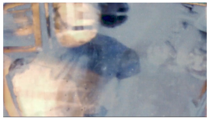 A hazy abstract muted dark blue and white, grey image.